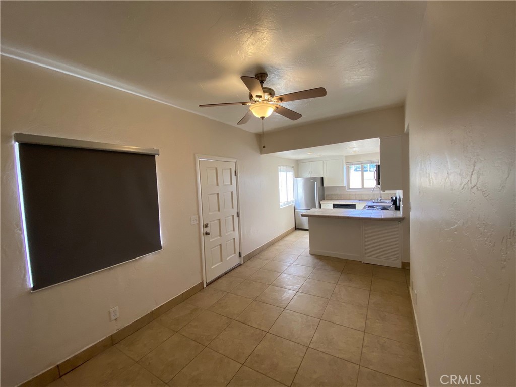 930 Orpheus Avenue, Unit A Encinitas, CA 92024 - Photo 7 of 18 a view of an empty room with a kitchen