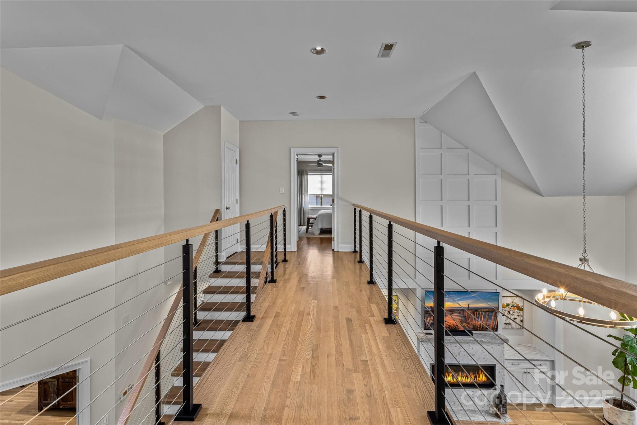 18916 Riverwind Lane Davidson, NC 28036 - Photo 24 of 38 a view of entryway and hall with wooden floor