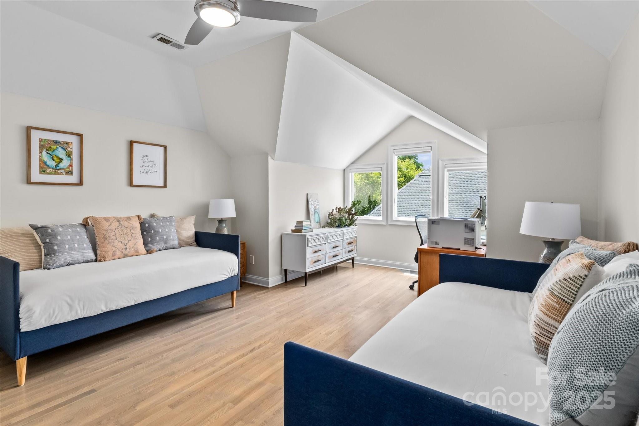 18916 Riverwind Lane Davidson, NC 28036 - Photo 25 of 38 a living room with furniture and a wooden floor