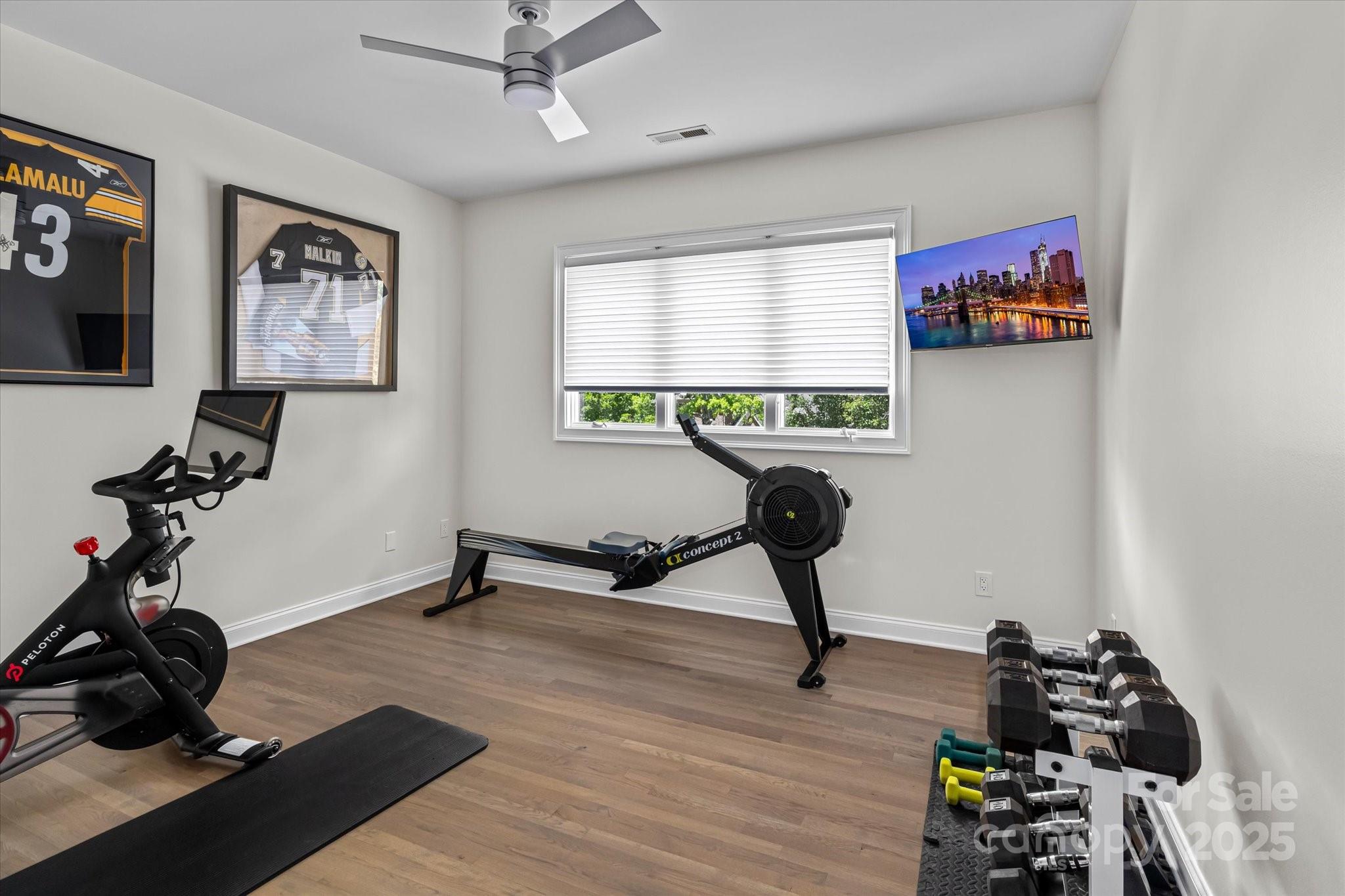 18916 Riverwind Lane Davidson, NC 28036 - Photo 29 of 38 a view of a workspace with furniture and a window
