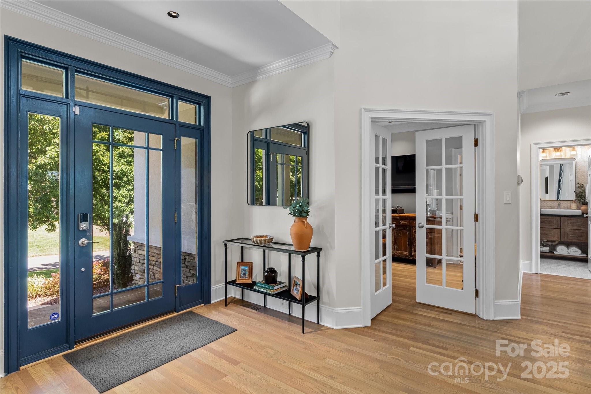 18916 Riverwind Lane Davidson, NC 28036 - Photo 4 of 38 a view of a livingroom with wooden floor and a rug
