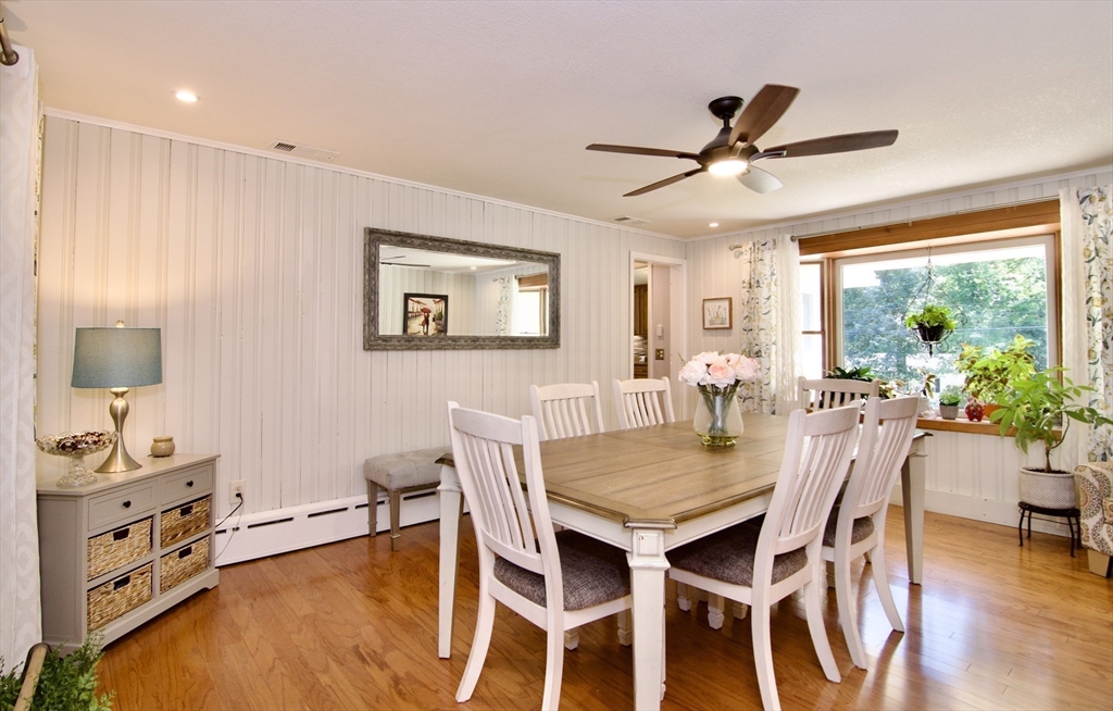 1070 Plumtree Road Springfield, MA 01119 - Photo 14 of 40 a view of a dining room with furniture window and wooden floor