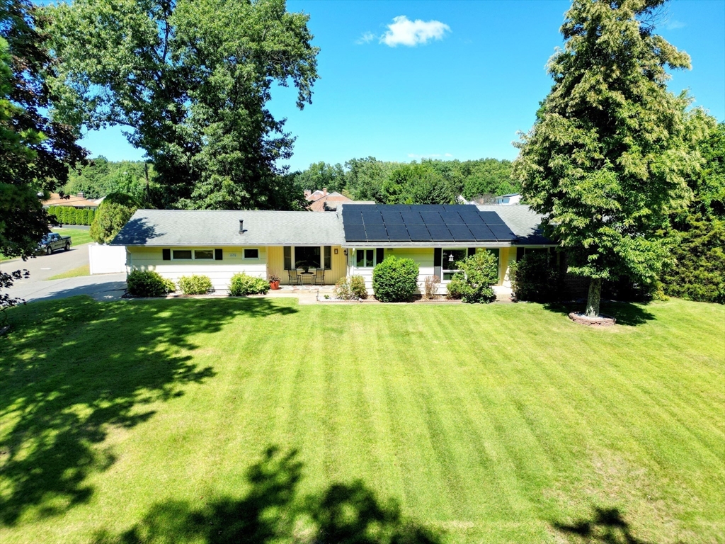 1070 Plumtree Road Springfield, MA 01119 - Photo 2 of 40 a view of house with an outdoor space and seating area