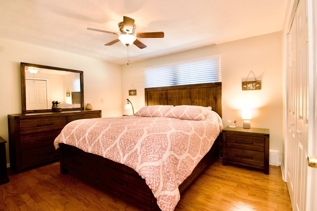 1070 Plumtree Road Springfield, MA 01119 - Photo 21 of 40 a bedroom with a bed and a night stand