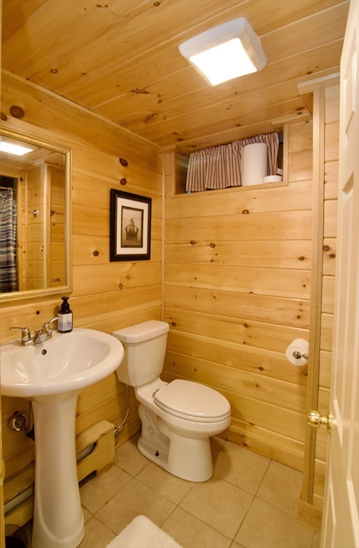 1070 Plumtree Road Springfield, MA 01119 - Photo 34 of 40 a bathroom with a toilet sink and shower