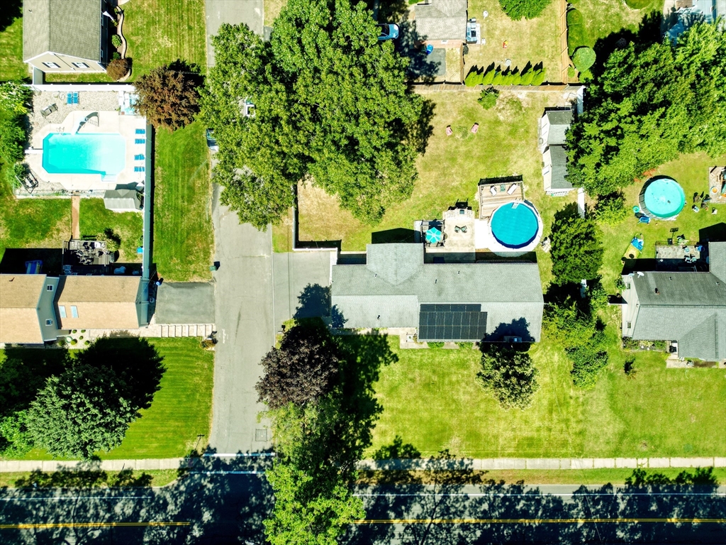 1070 Plumtree Road Springfield, MA 01119 - Photo 40 of 40 an aerial view of a house with a yard and large trees