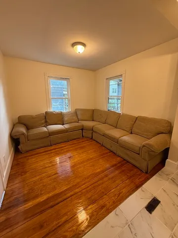 a living room with furniture and a couch