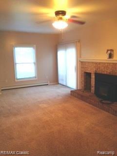5600 North Fleming Road Fowlerville, MI 48836 - Photo 6 of 34 family room 2.jpg