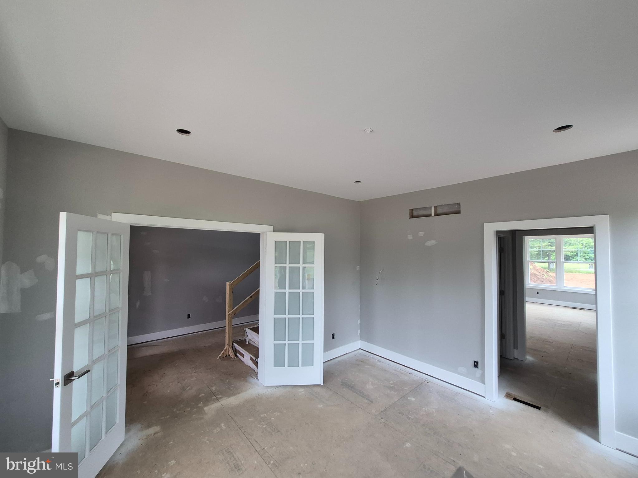 324 Bishop Hollow Road Newtown Square, PA 19073 - Photo 4 of 37 a view of an empty room with closet and a window