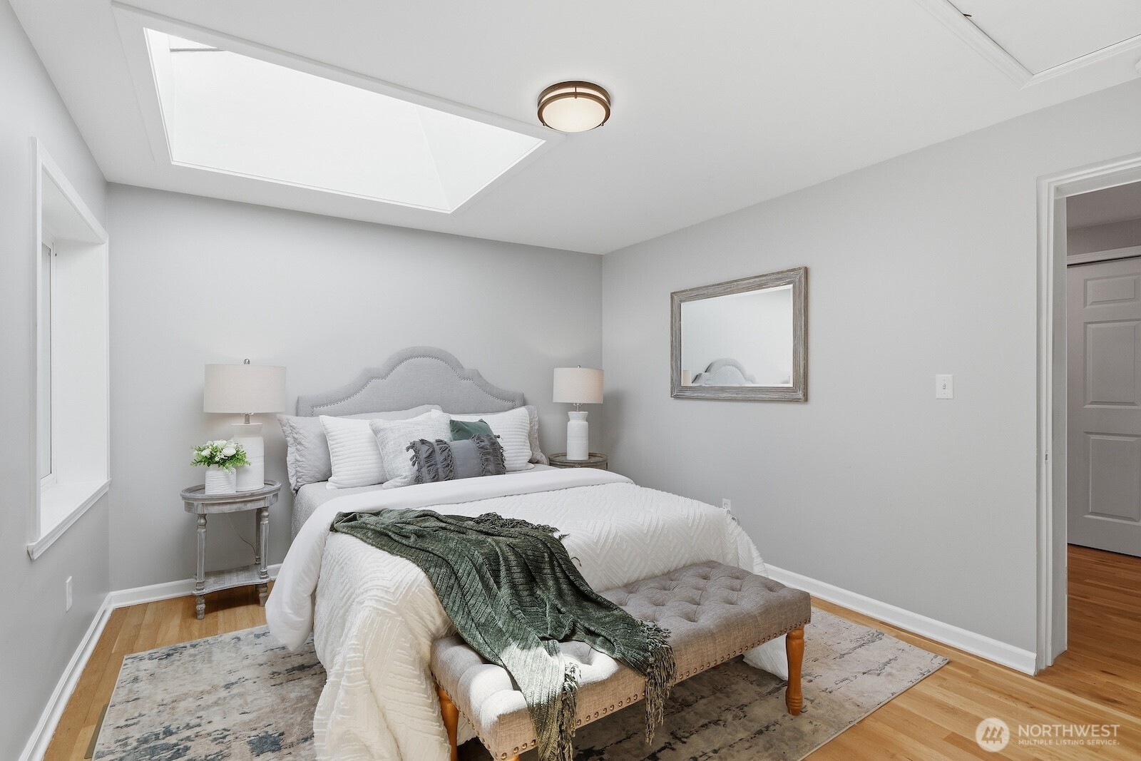 11617 Fay Road Northeast Carnation, WA 98014 - Photo 12 of 40 a bedroom with a bed and a window