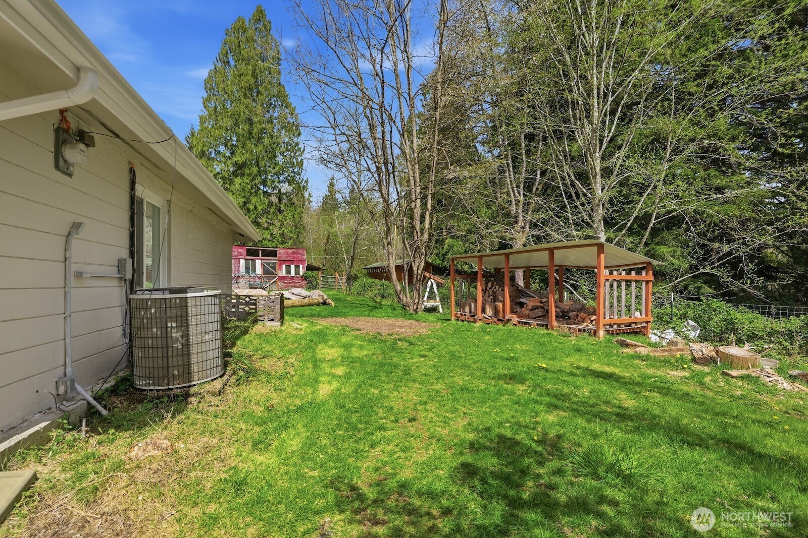 11617 Fay Road Northeast Carnation, WA 98014 - Photo 23 of 40 a view of a front of house with a yard