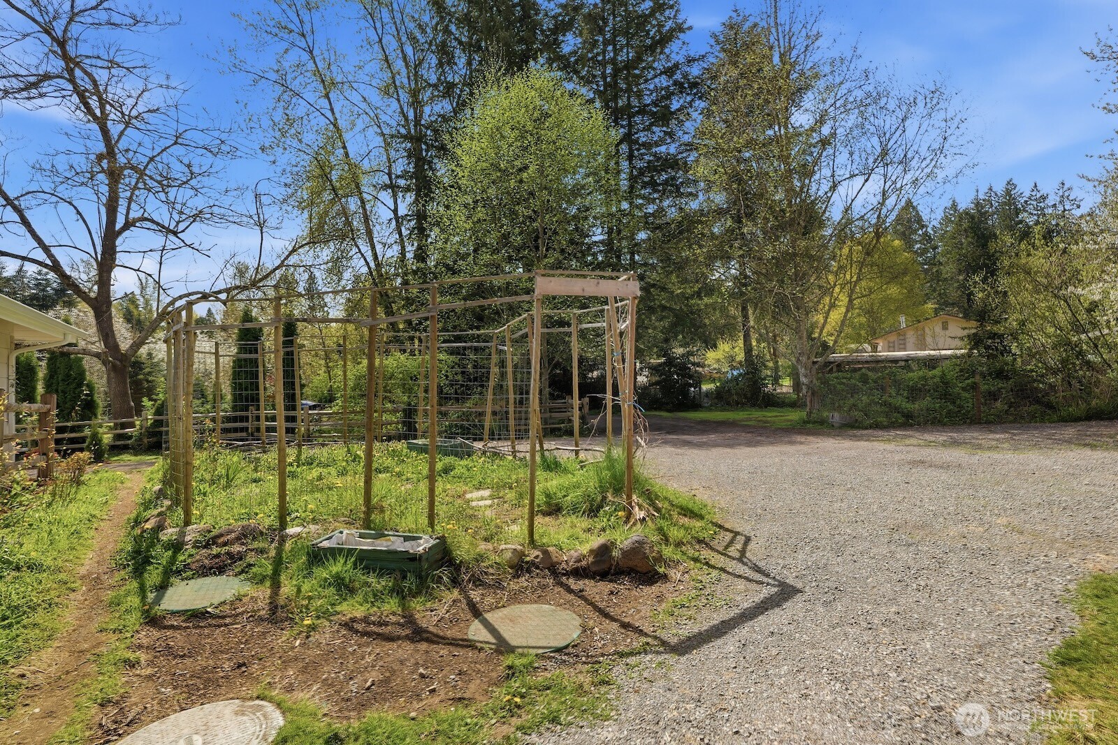 11617 Fay Road Northeast Carnation, WA 98014 - Photo 34 of 40 a backyard of a house with table and chairs