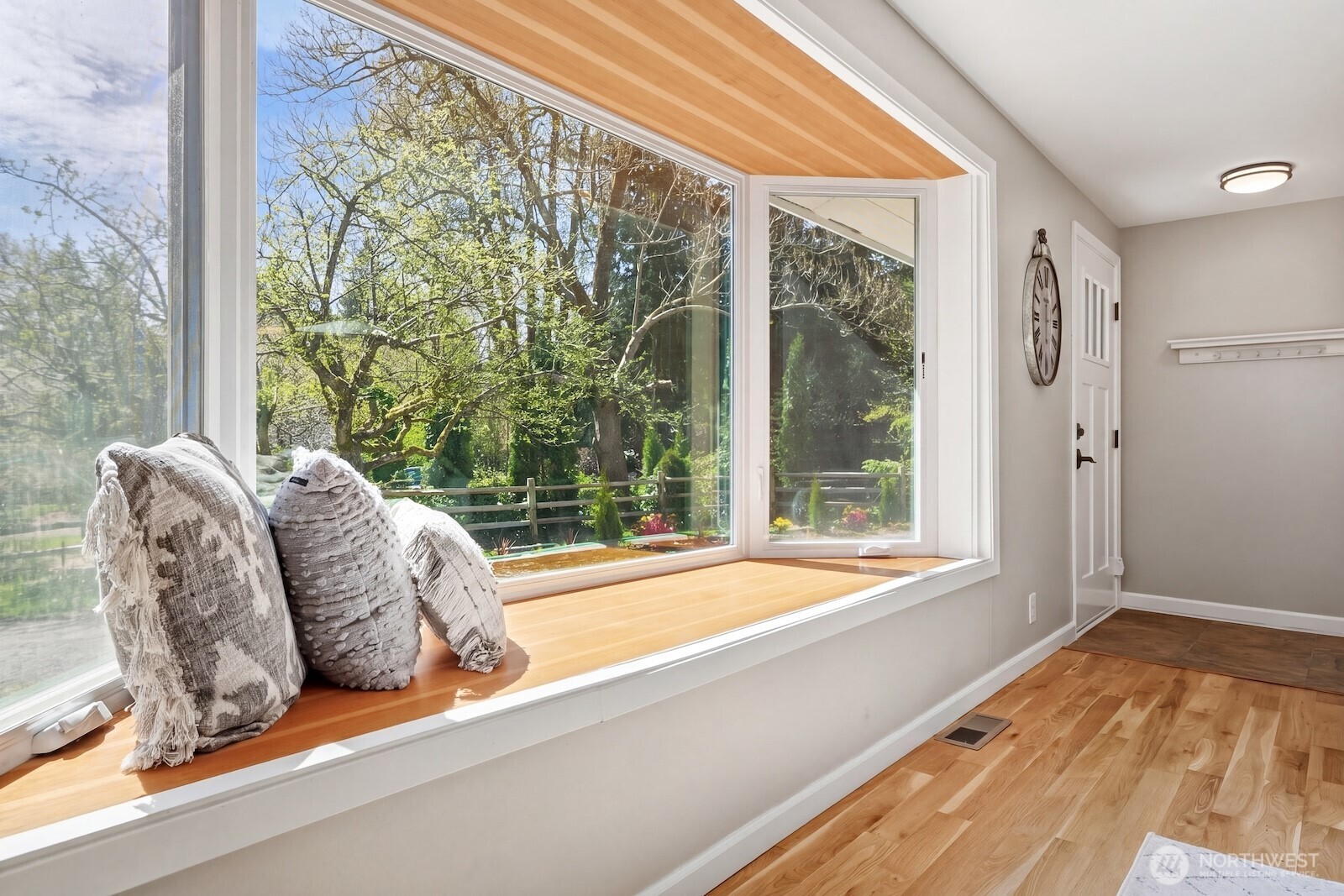 11617 Fay Road Northeast Carnation, WA 98014 - Photo 6 of 40 a living room with a large window and a bed