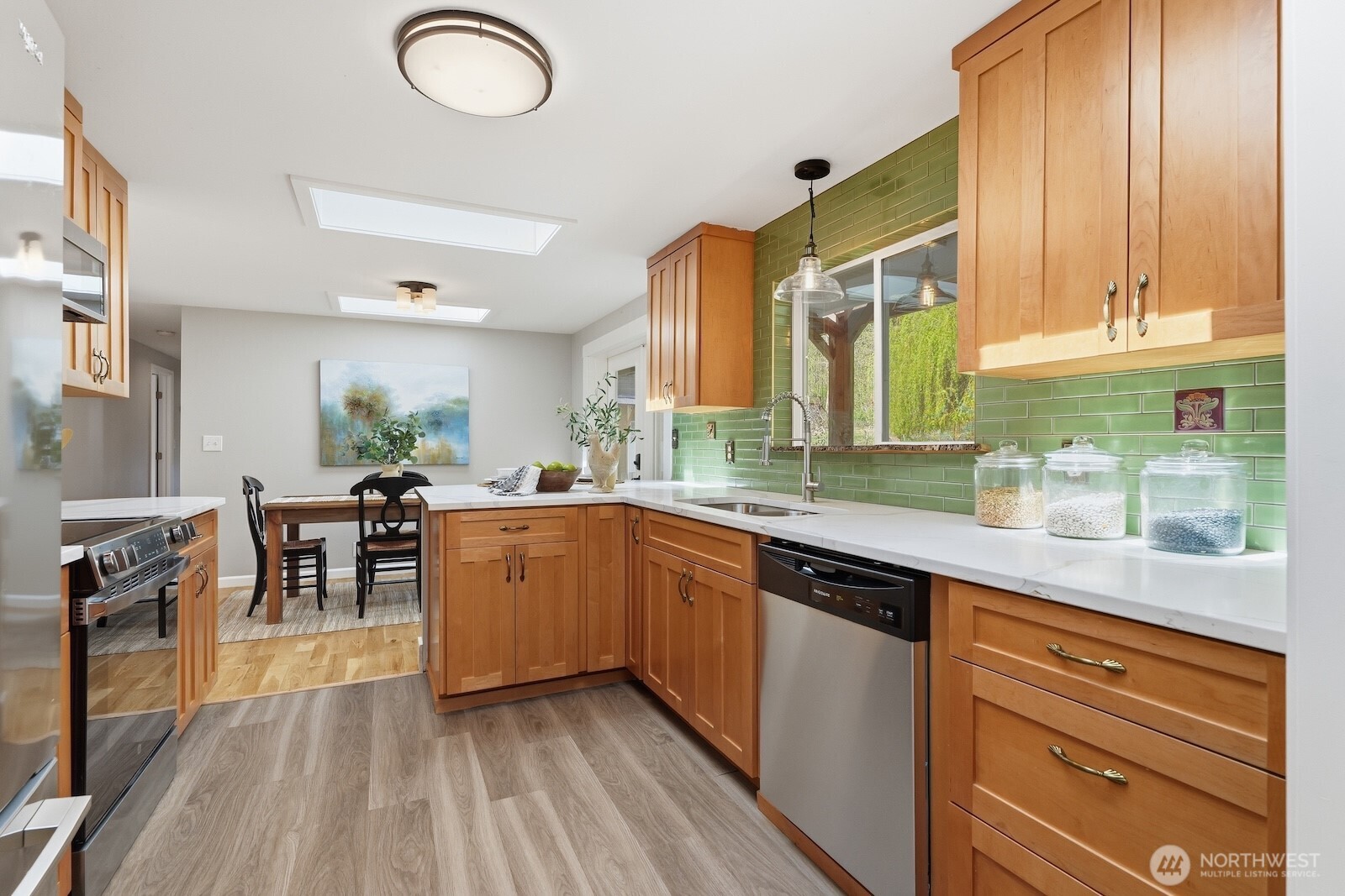 11617 Fay Road Northeast Carnation, WA 98014 - Photo 9 of 40 a kitchen with sink cabinets and window