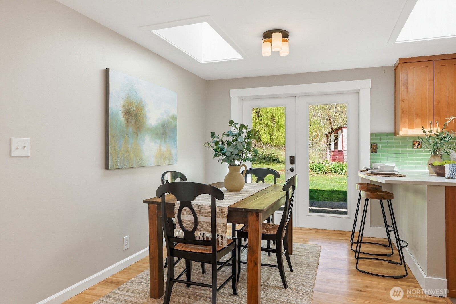 11617 Fay Road Northeast Carnation, WA 98014 - Photo 10 of 40 a view of a dining room with furniture window and outside view