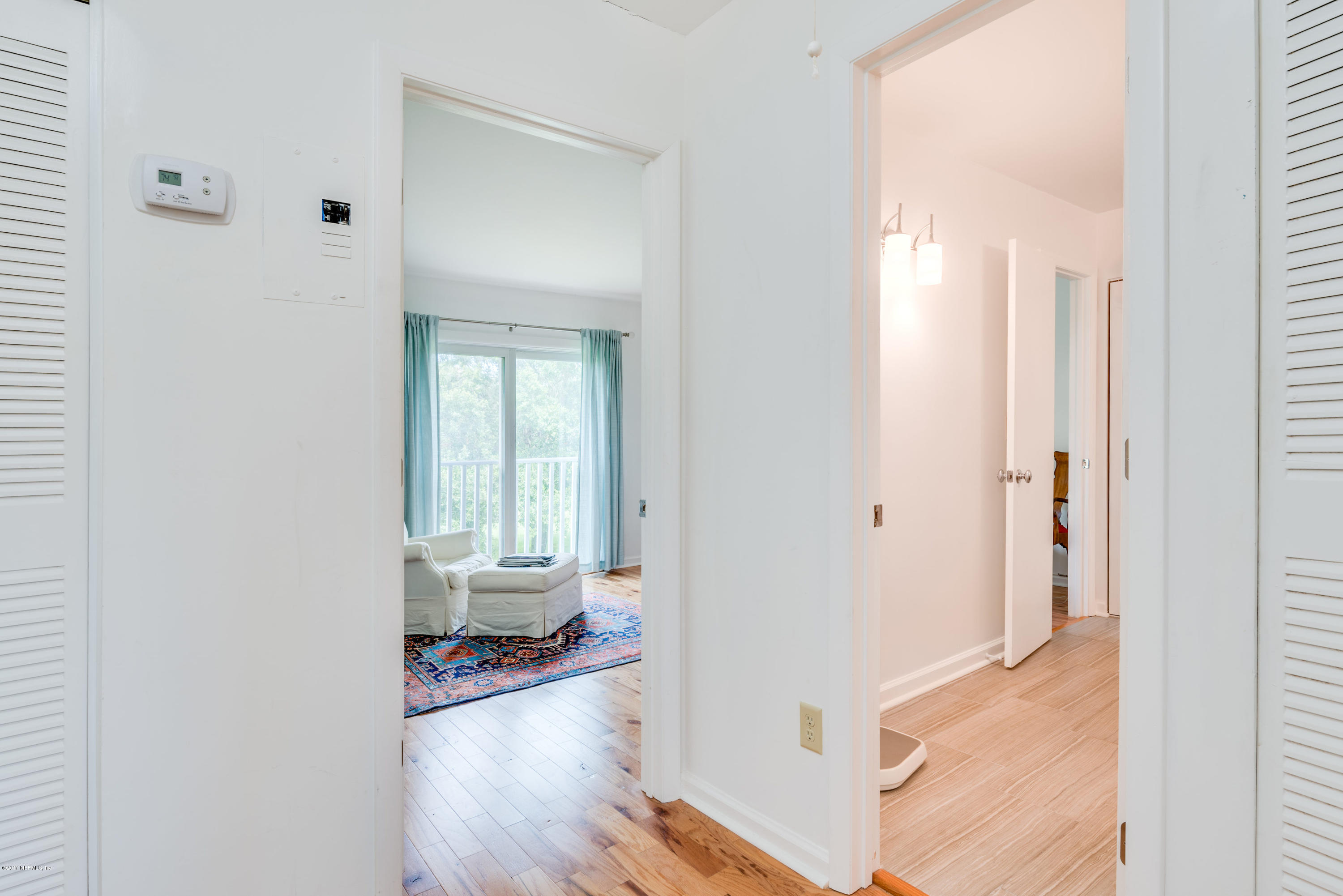 2233 Seminole Road, Unit 1 Atlantic Beach, FL 32233 - Photo 15 of 35 a view of a room with wooden floor and windows