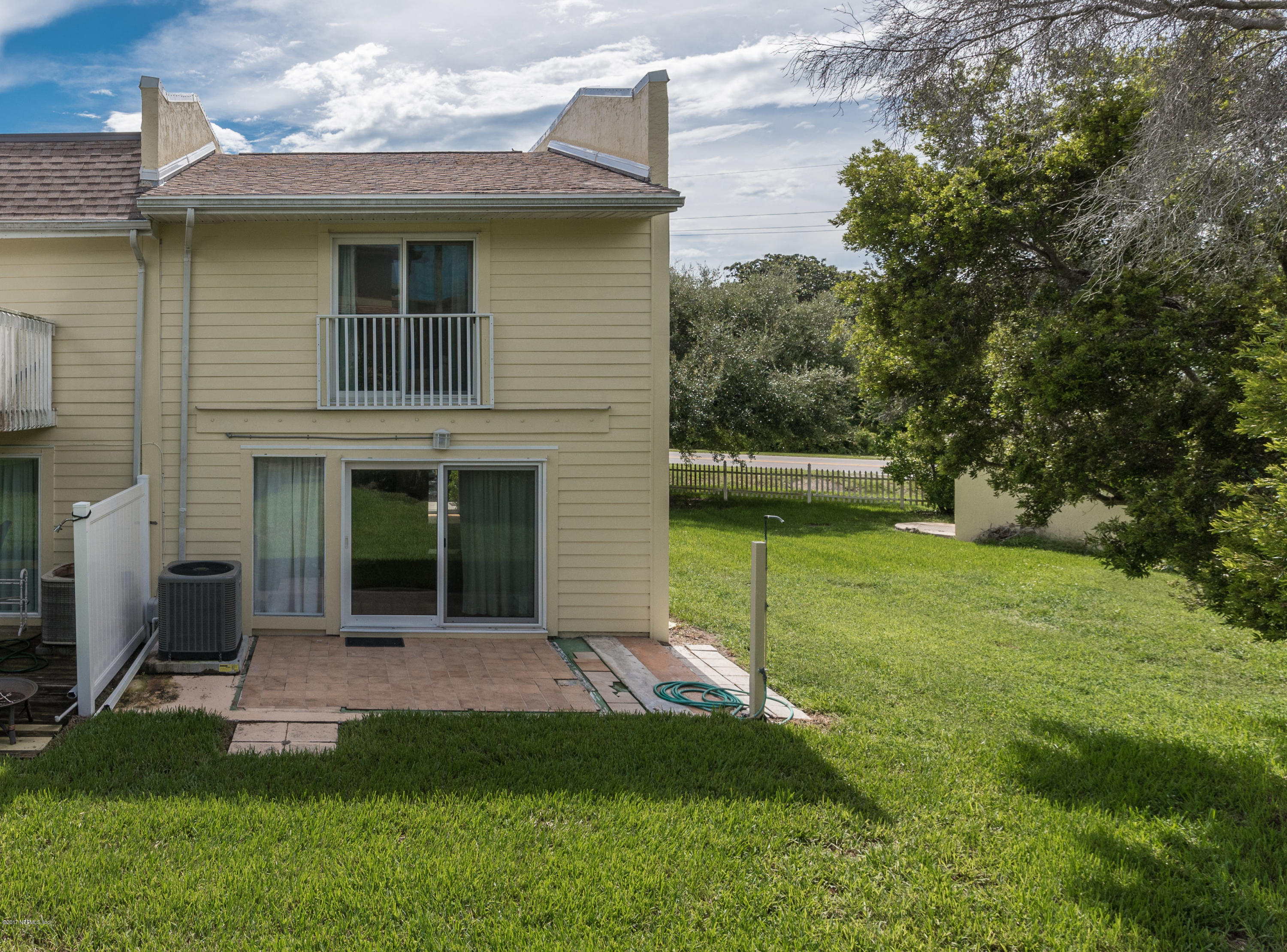 2233 Seminole Road, Unit 1 Atlantic Beach, FL 32233 - Photo 17 of 35 a view of a house with a yard