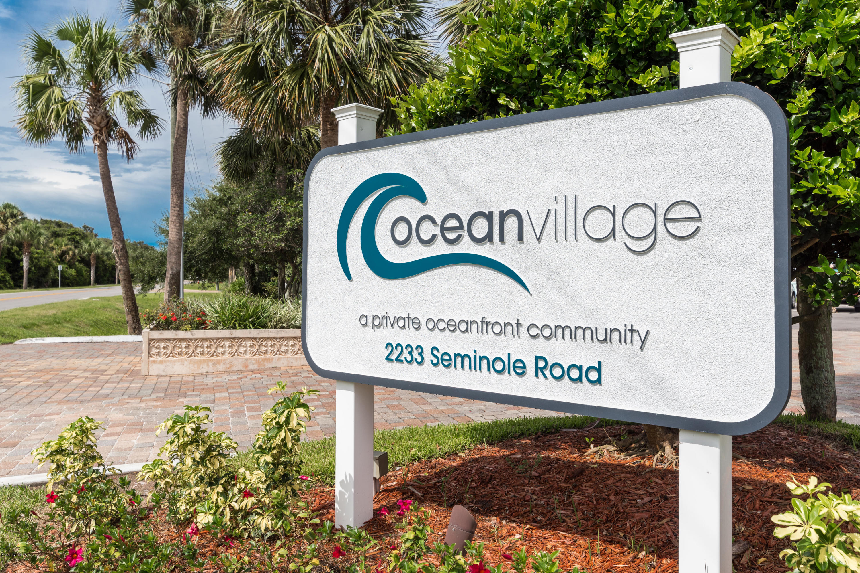 2233 Seminole Road, Unit 1 Atlantic Beach, FL 32233 - Photo 27 of 35 a sign on the side of a building