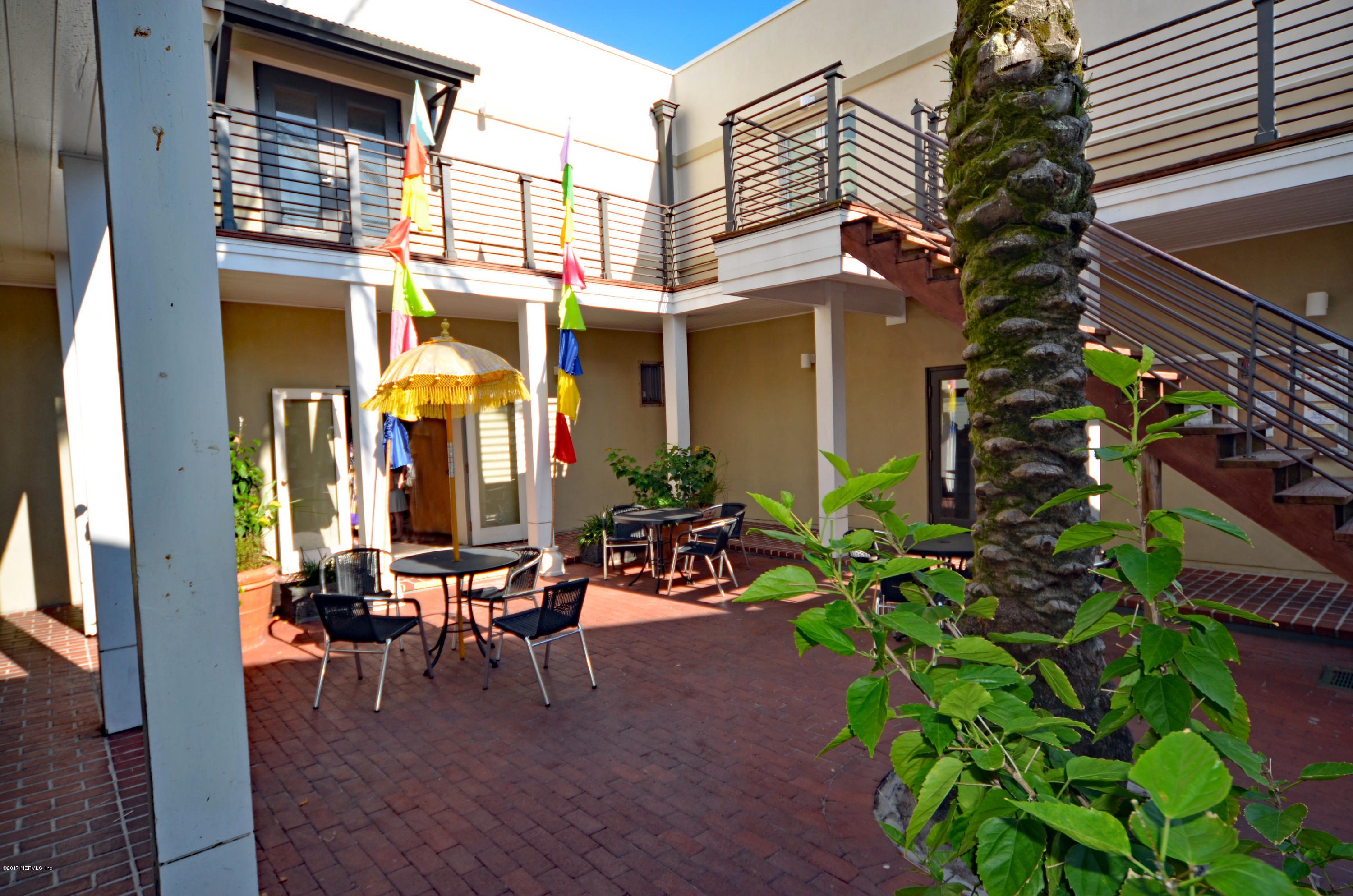 2233 Seminole Road, Unit 1 Atlantic Beach, FL 32233 - Photo 32 of 35 a view of a chairs and table in a patio