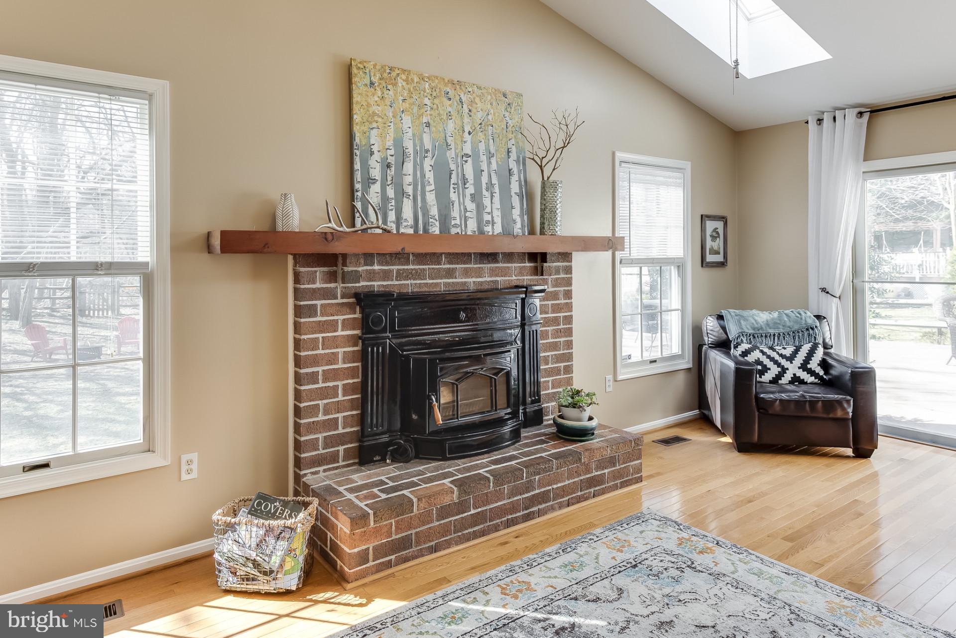 307 Riding Ridge Road Annapolis, MD 21403 - Photo 15 of 36 a living room with furniture and a fireplace