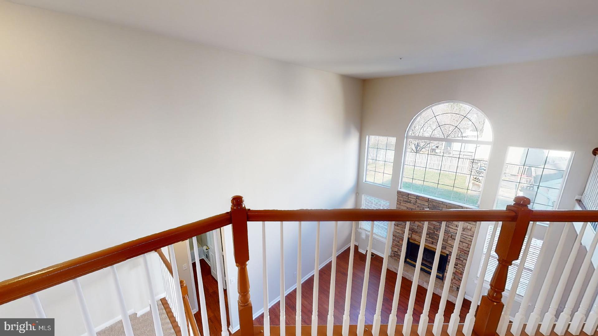 9418 Ardwick Ardmore Road Springdale, MD 20721 - Photo 27 of 56 Overlooking 2 story family room