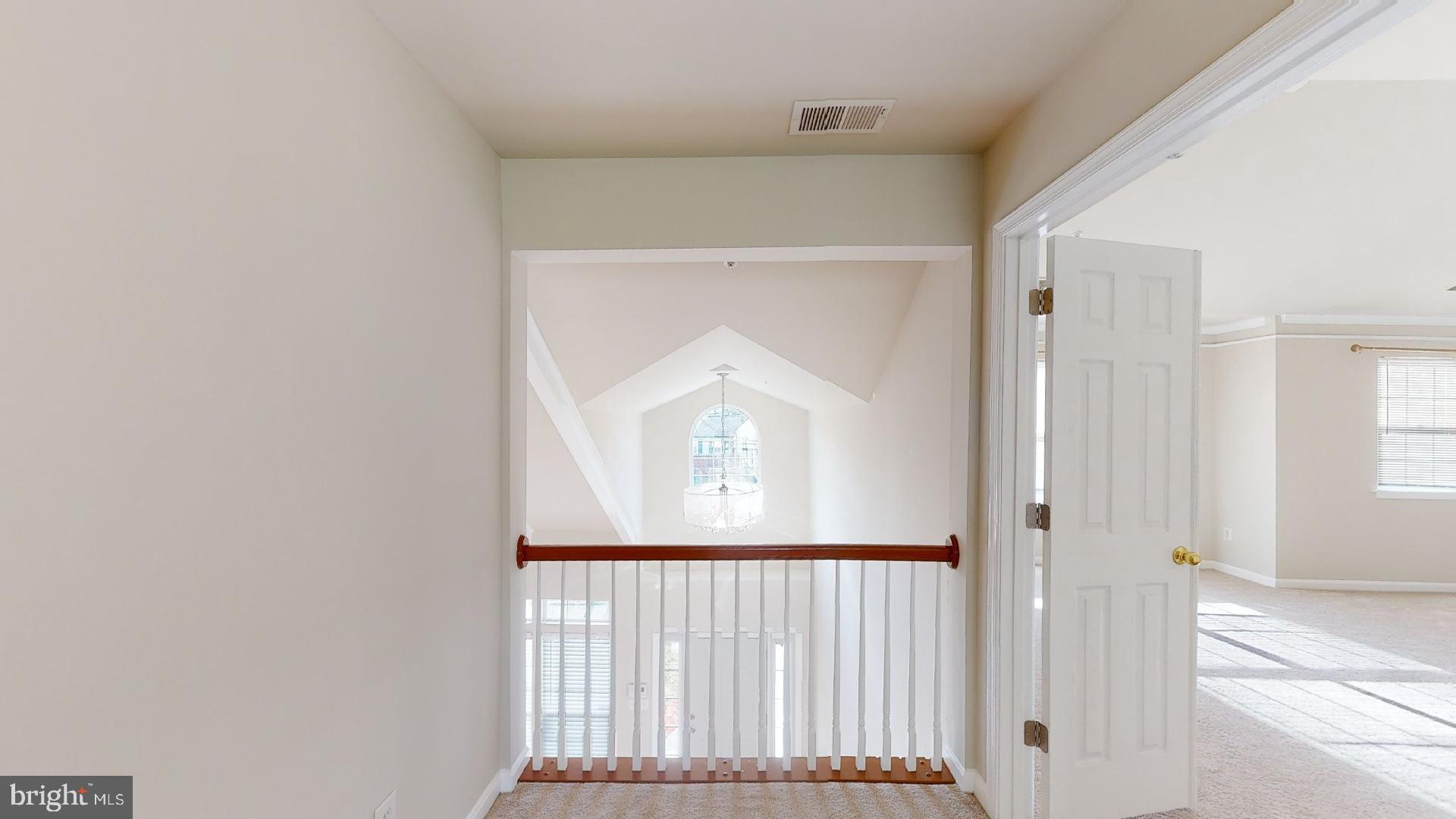 9418 Ardwick Ardmore Road Springdale, MD 20721 - Photo 31 of 56 Overlook into 2 story entryway