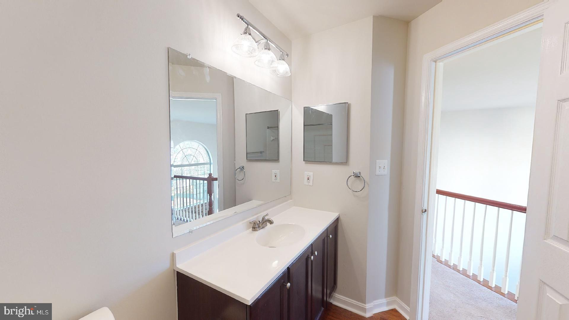9418 Ardwick Ardmore Road Springdale, MD 20721 - Photo 43 of 56 2nd level hall bath