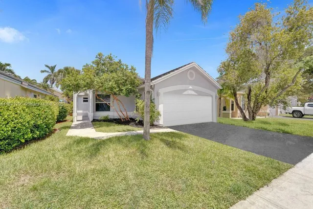 a house view with a outdoor space