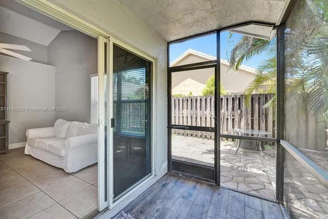 a view of front door and bedroom