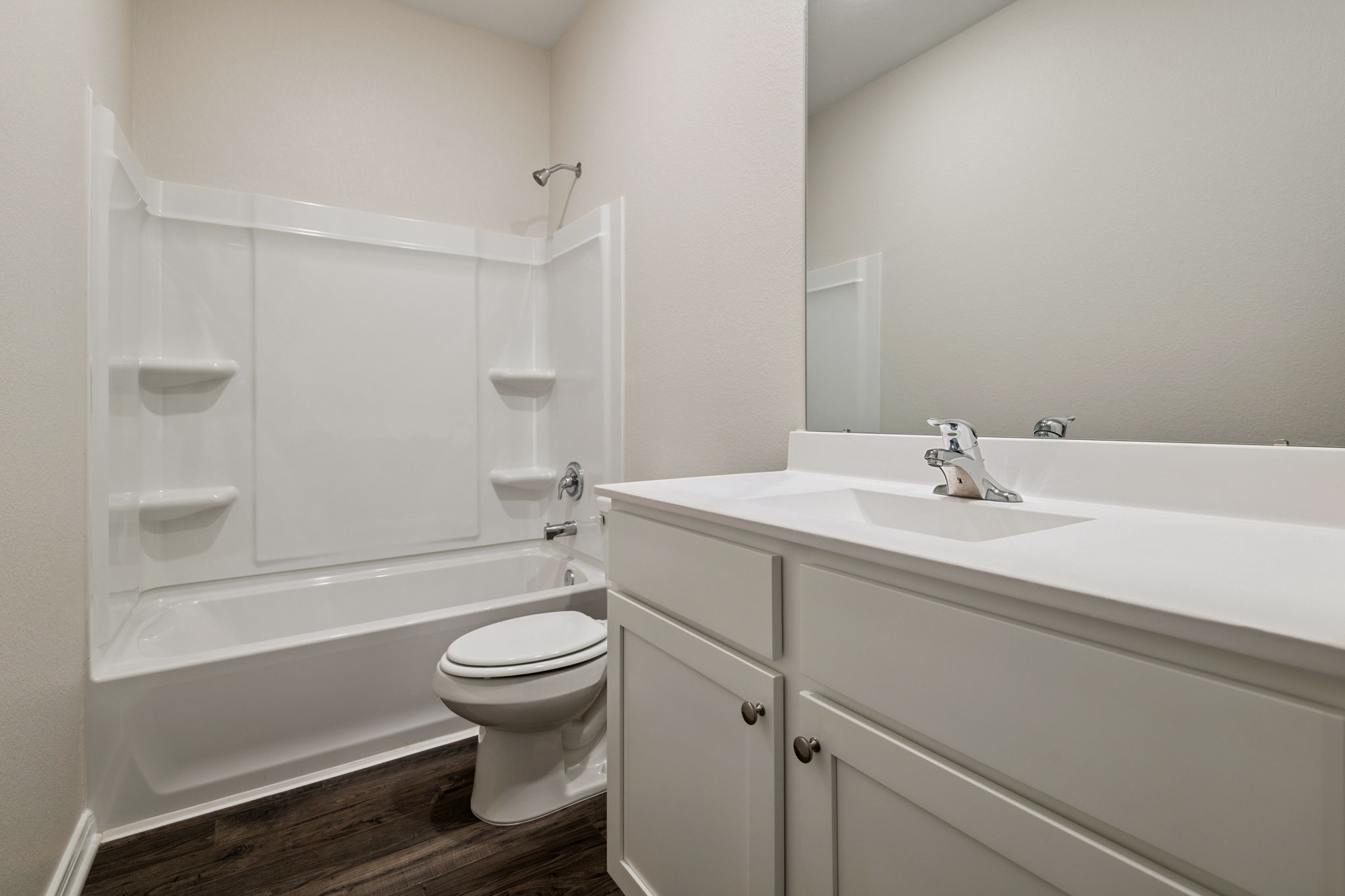 15434 Maple Ter Drive Conroe, TX 77303 - Photo 13 of 25 a bathroom with a sink a toilet and shower