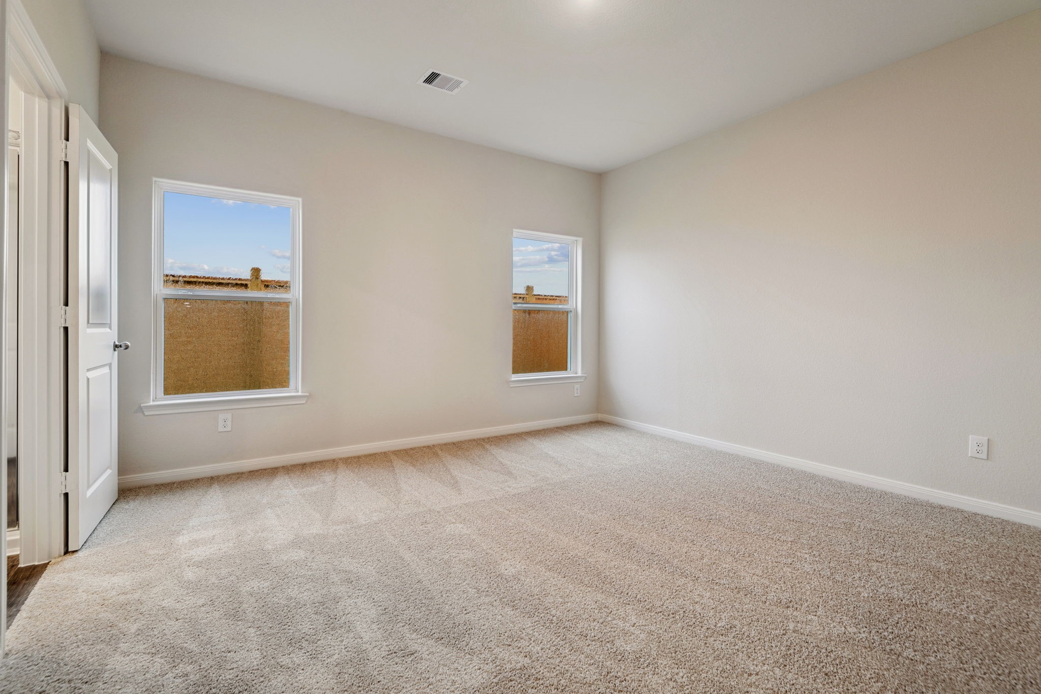 15434 Maple Ter Drive Conroe, TX 77303 - Photo 15 of 25 a view of an empty room with window and closet area