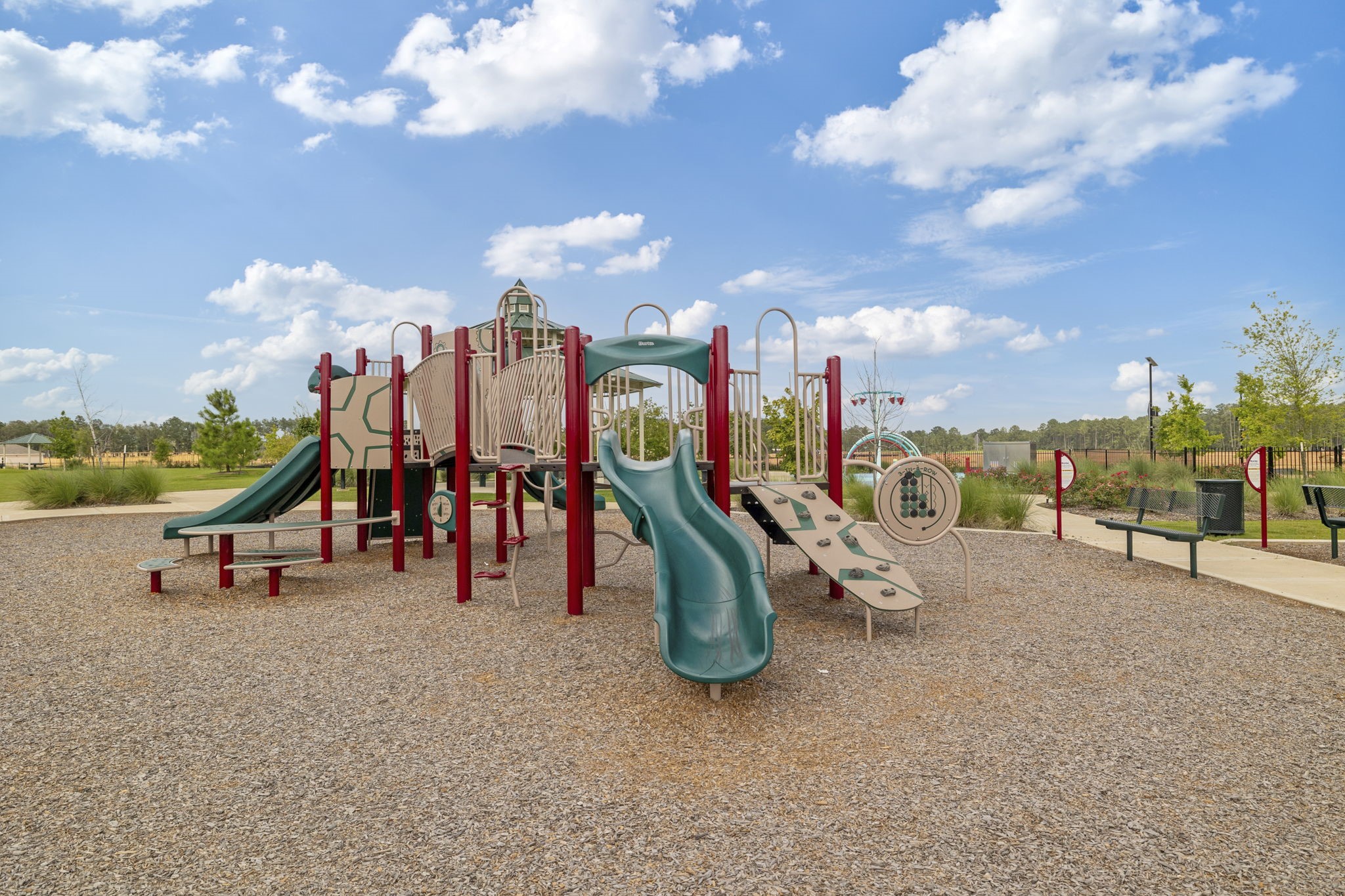 15434 Maple Ter Drive Conroe, TX 77303 - Photo 20 of 25 a view of a park with swings