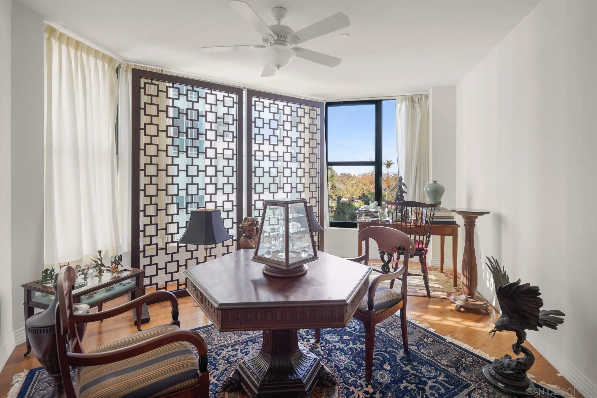 2500 Sixth Avenue, Unit 605 San Diego, CA 92103 - Photo 24 of 29 a view of a dining room with furniture window and outside view