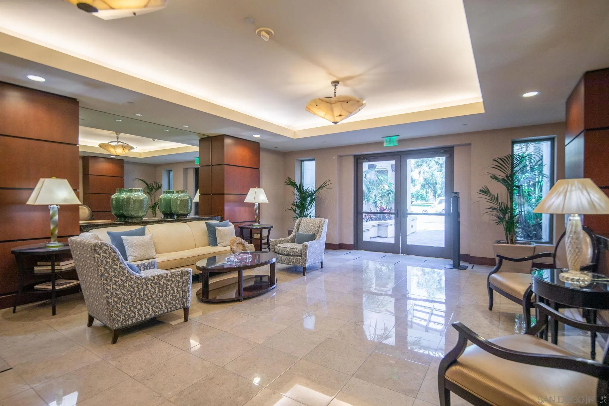 2500 Sixth Avenue, Unit 605 San Diego, CA 92103 - Photo 4 of 29 a living room with furniture fireplace and a large window
