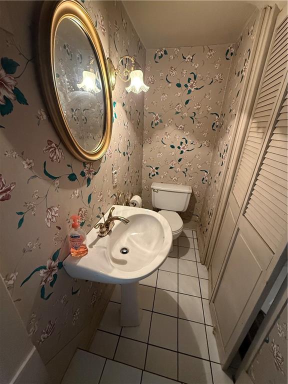 433 Miller Avenue Butler, PA 16001 - Photo 14 of 29 a bathroom with a sink and a mirror