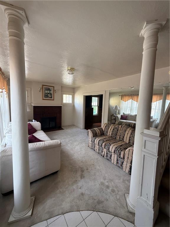 433 Miller Avenue Butler, PA 16001 - Photo 3 of 29 a living room with furniture and a fireplace