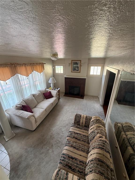 433 Miller Avenue Butler, PA 16001 - Photo 5 of 29 a living room with furniture a ceiling fan and a rug