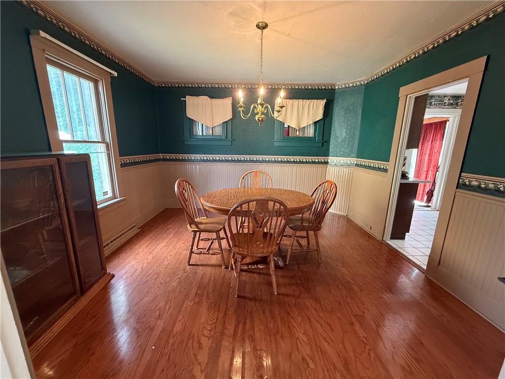 433 Miller Avenue Butler, PA 16001 - Photo 8 of 29 a view of a dining room with furniture window and wooden floor