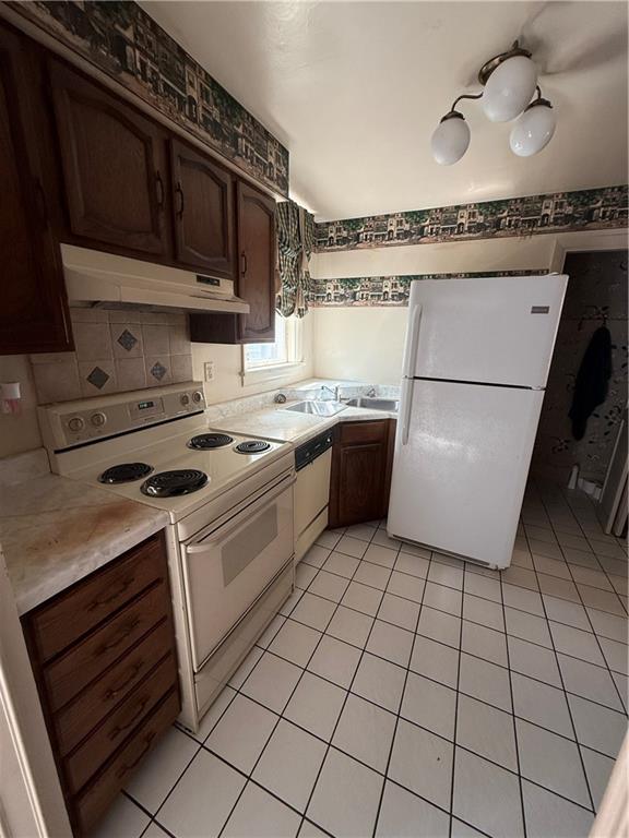 433 Miller Avenue Butler, PA 16001 - Photo 10 of 29 a kitchen with a stove a sink and a microwave