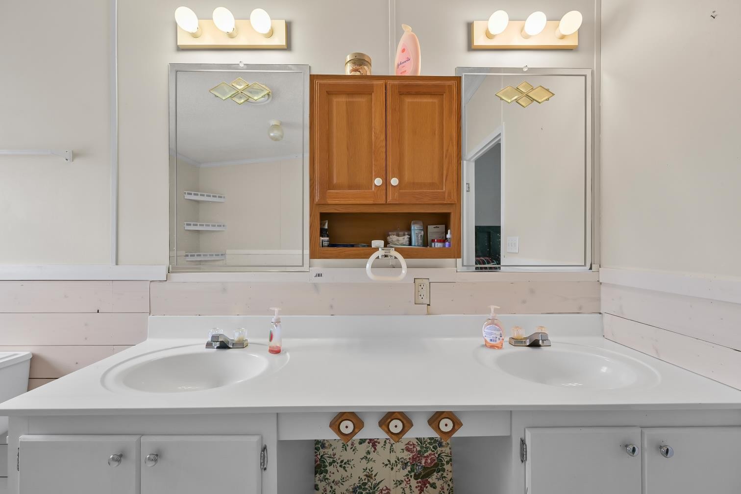 6439 Cedar Grove Road Big Sandy, TN 38221 - Photo 14 of 38 a bathroom with a sink and a mirror
