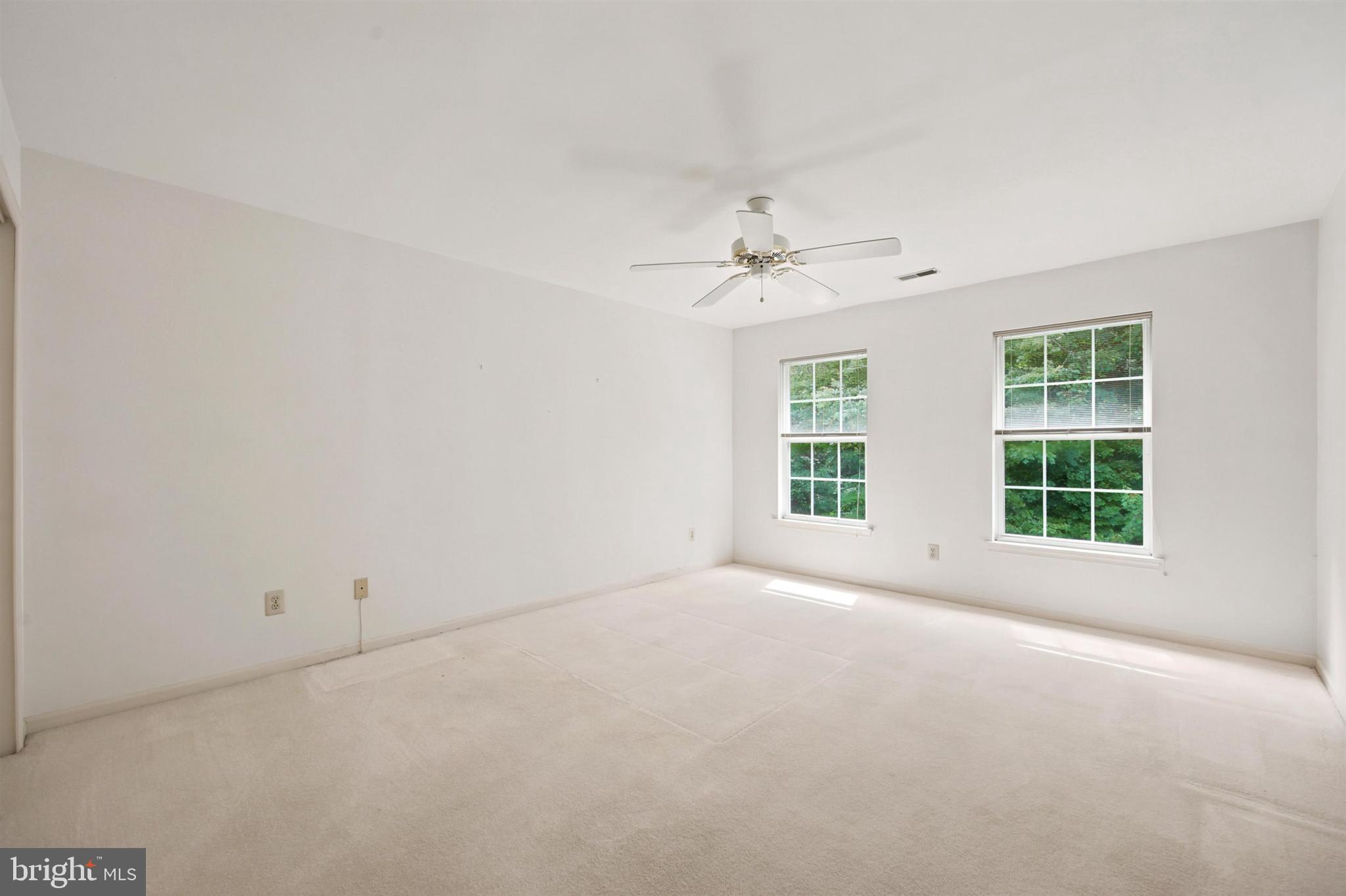 1652 Covington Road Yardley, PA 19067 - Photo 3 of 15 wooden floor in an empty room with a window