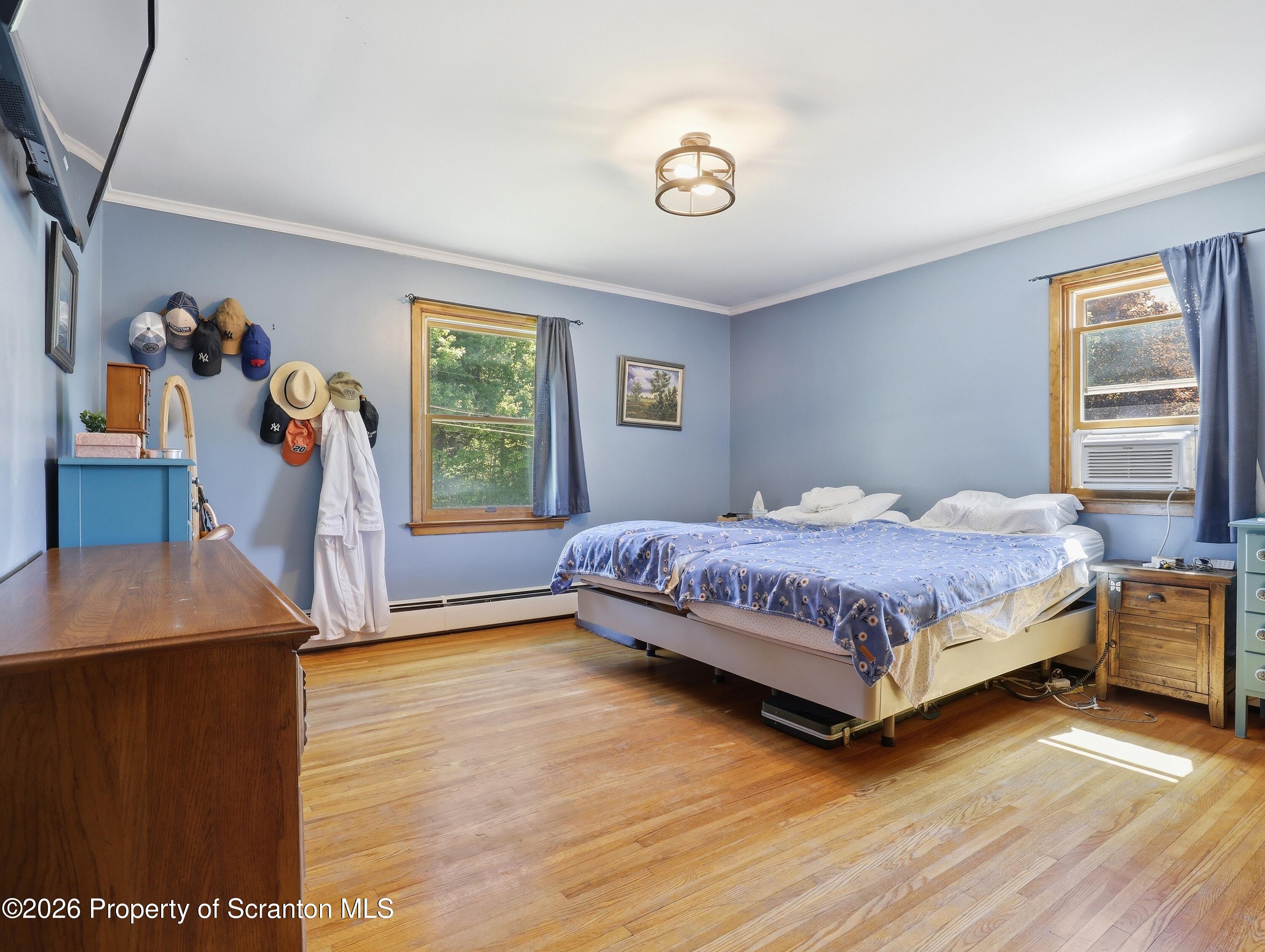 1237 Heart Lake Road Scott Township, PA 18433 - Photo 12 of 39 a bedroom with a bed and a window