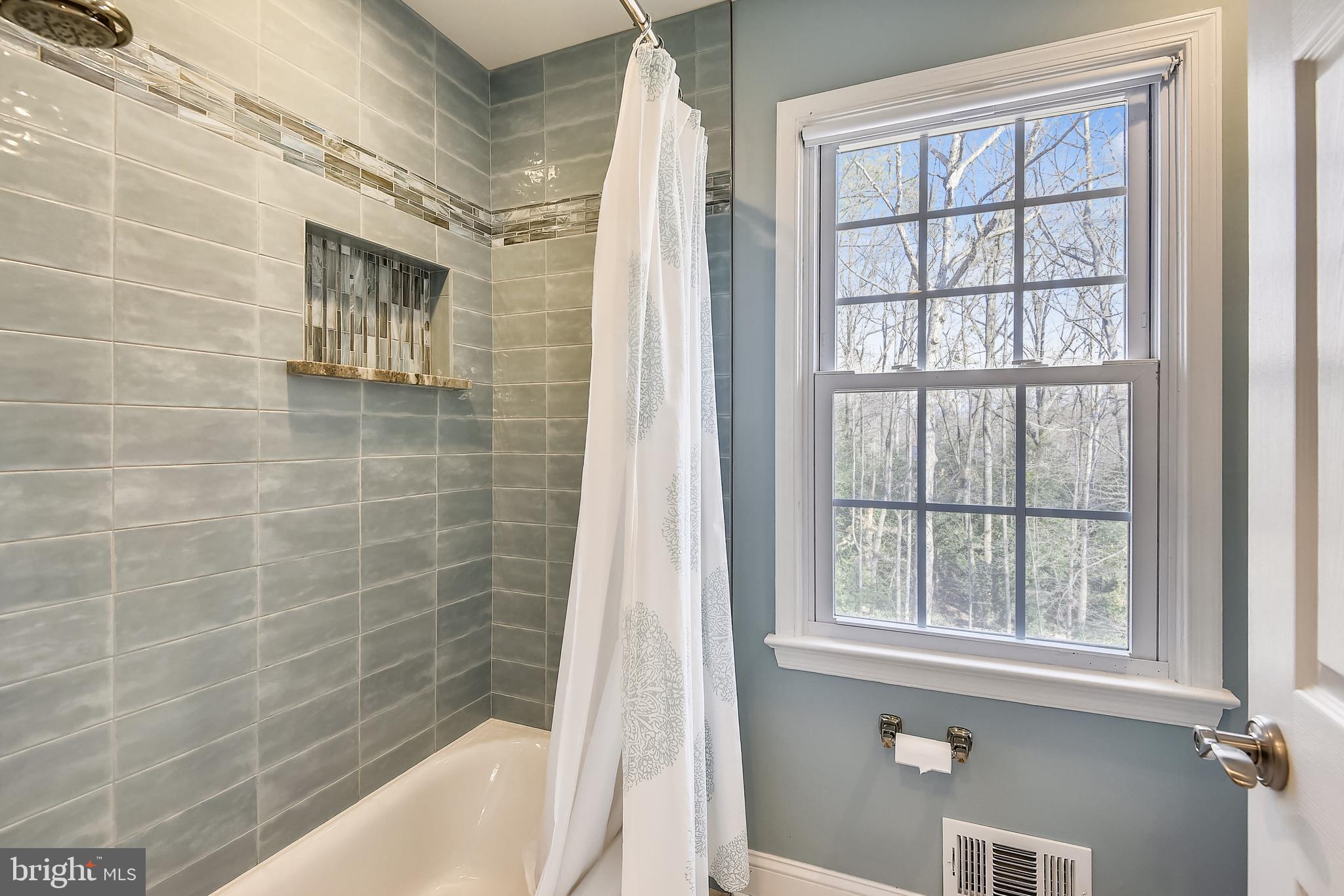 11924 Fawn Ridge Lane Reston, VA 20194 - Photo 37 of 58 Beautifully tiled shower in hall bath