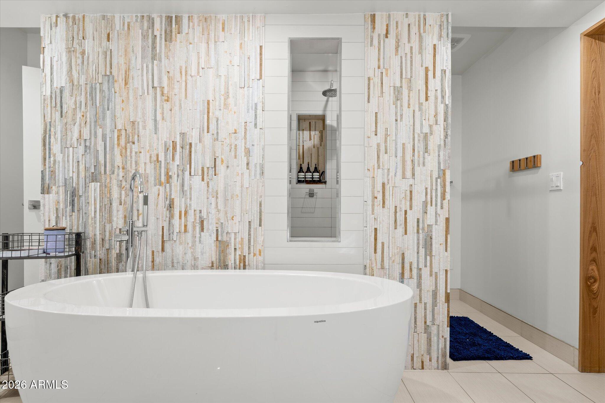 3812 East Coronado Road Phoenix, AZ 85008 - Photo 24 of 46 a white bath tub sitting next to a white sink