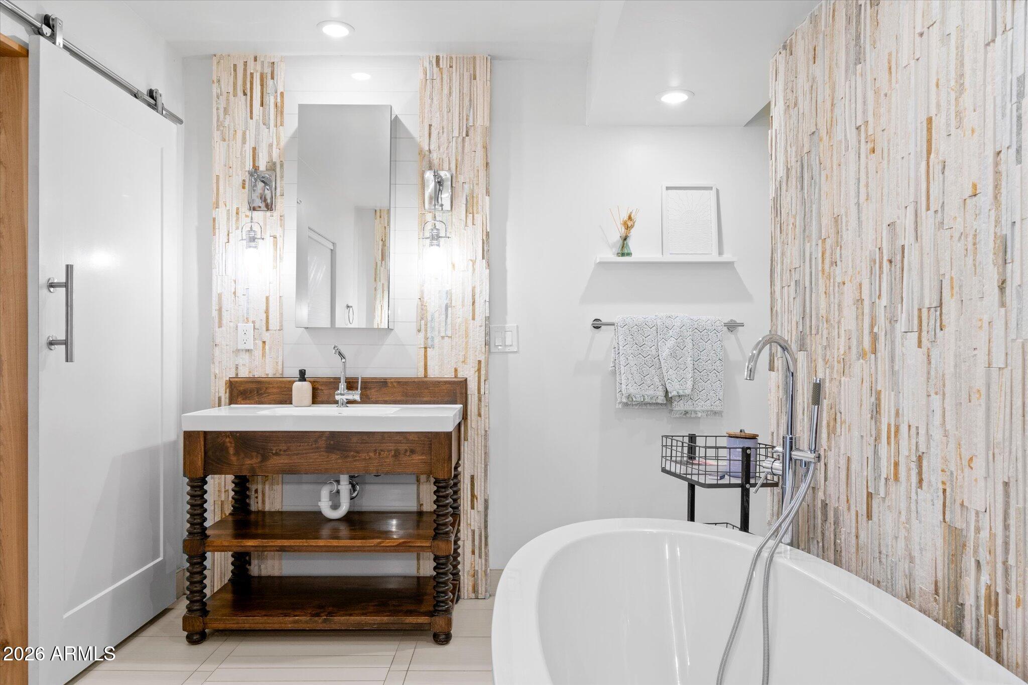 3812 East Coronado Road Phoenix, AZ 85008 - Photo 30 of 46 a bathroom with a sink a toilet and shower