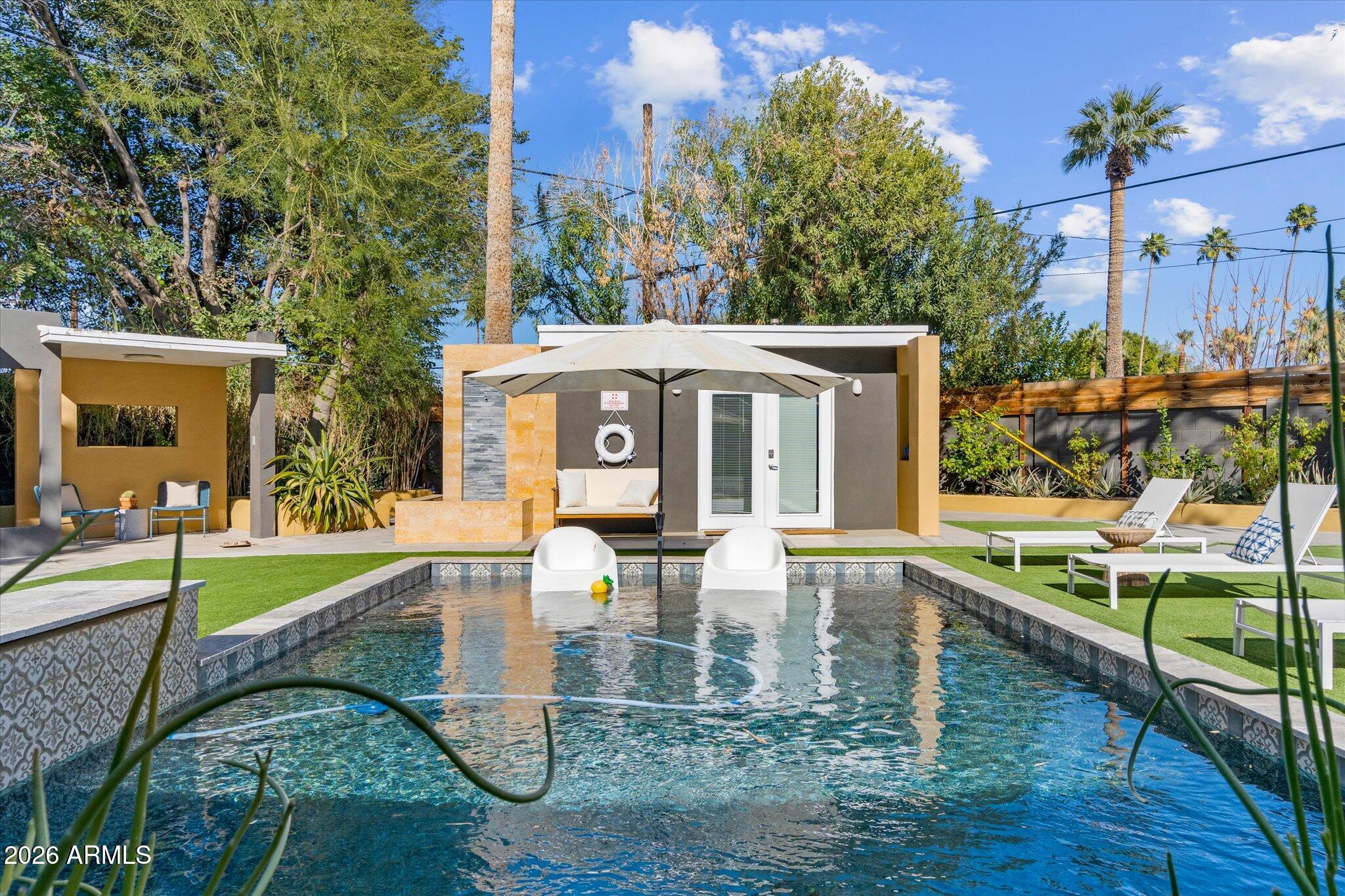 3812 East Coronado Road Phoenix, AZ 85008 - Photo 33 of 46 a view of a house with backyard and sitting area