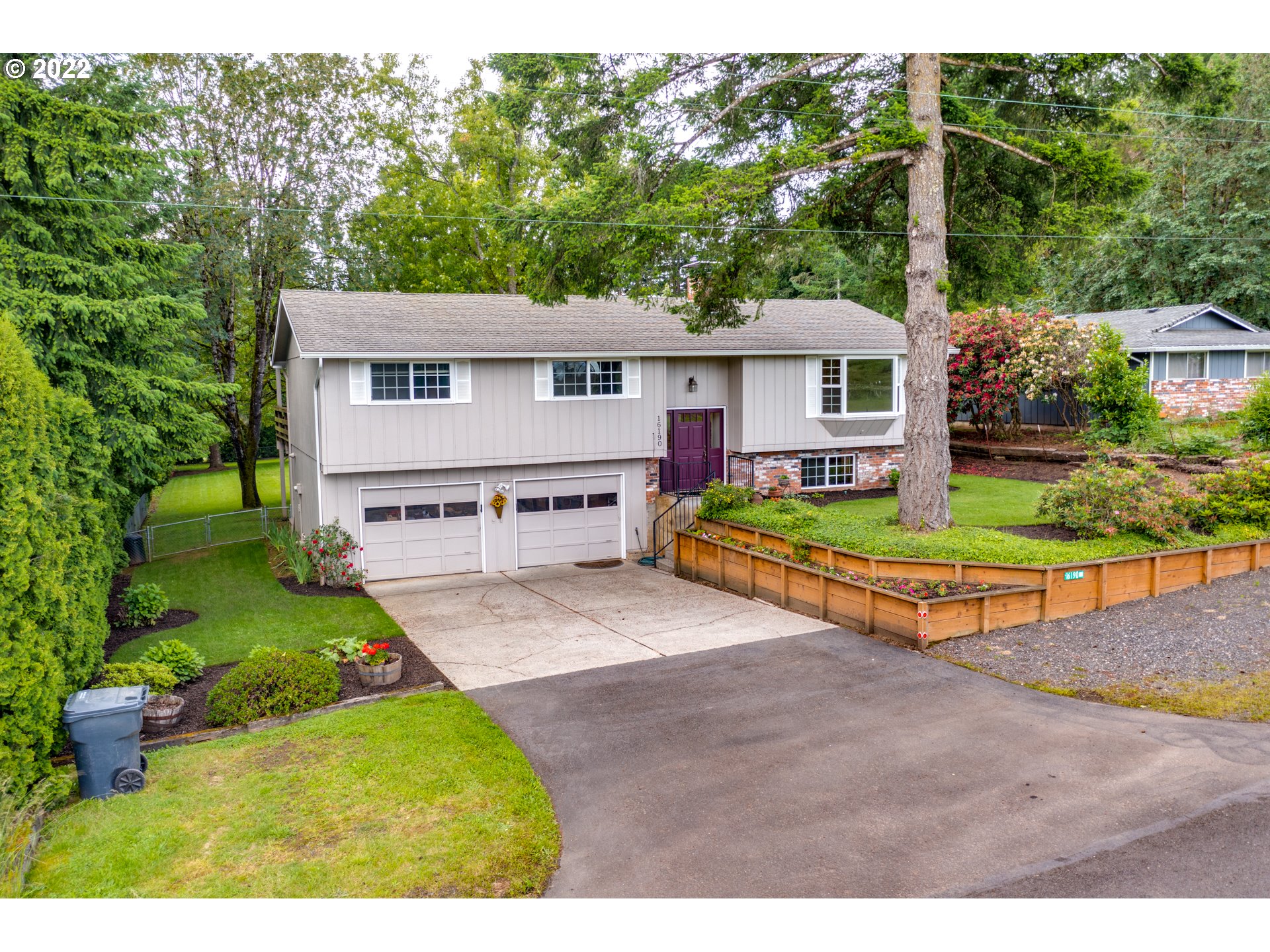 a view of house with outdoor entertaining spaces