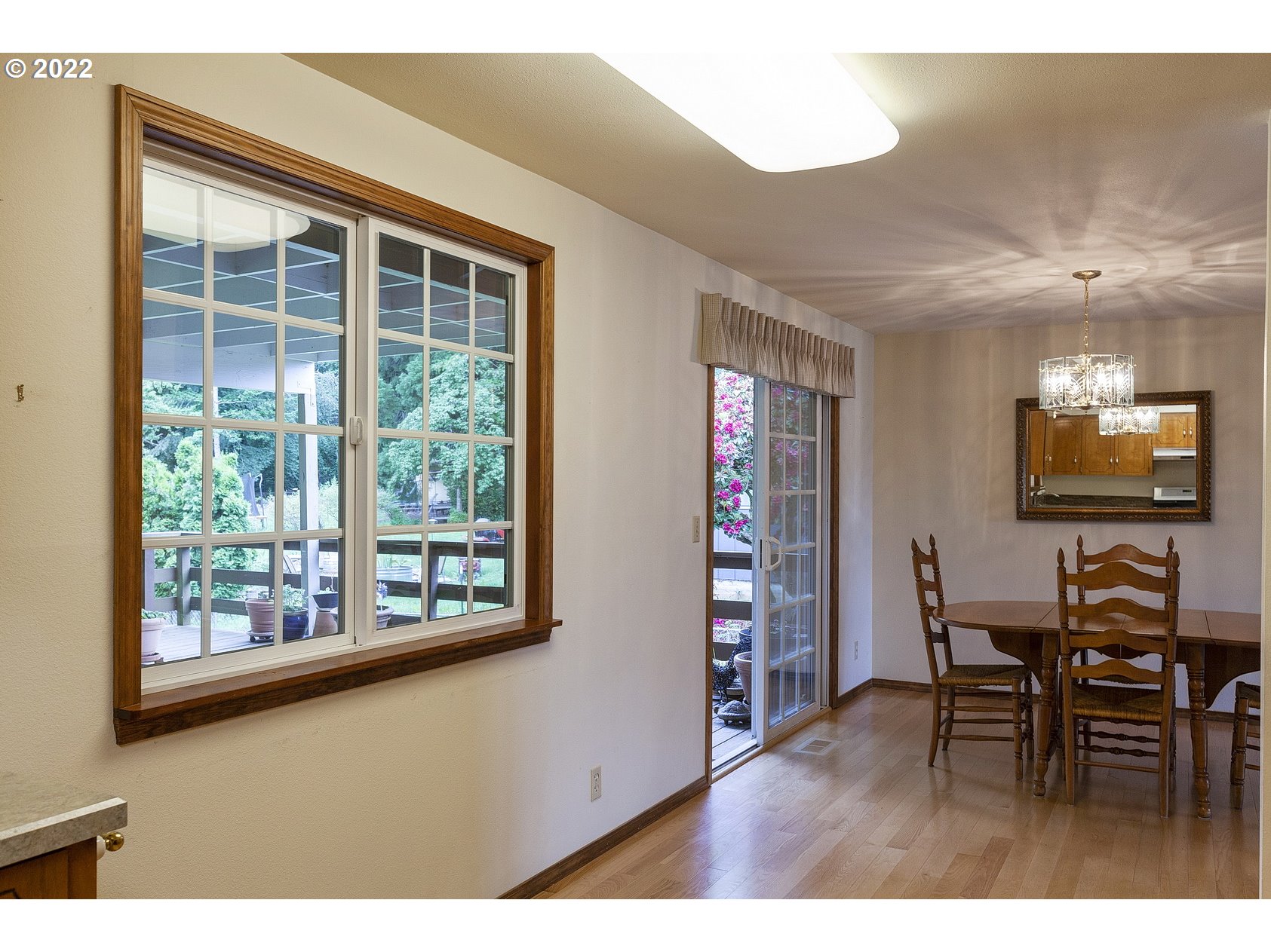 16190 South Wilson Road Oregon City, OR 97045 - Photo 14 of 32 a dining room with furniture and wooden floor