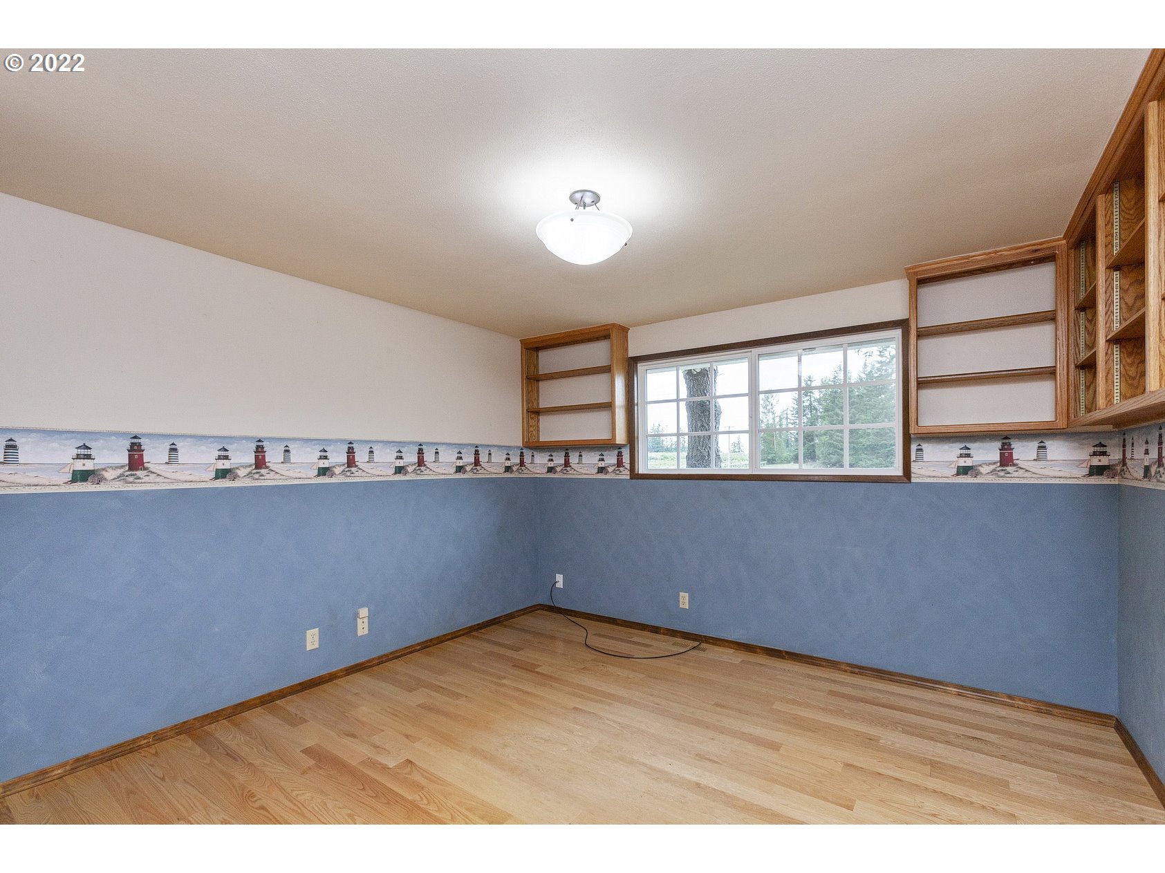 16190 South Wilson Road Oregon City, OR 97045 - Photo 16 of 32 a view of an empty room with a window