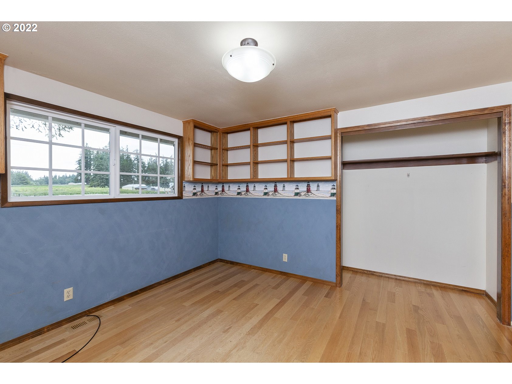 16190 South Wilson Road Oregon City, OR 97045 - Photo 17 of 32 a view of an empty room with a window